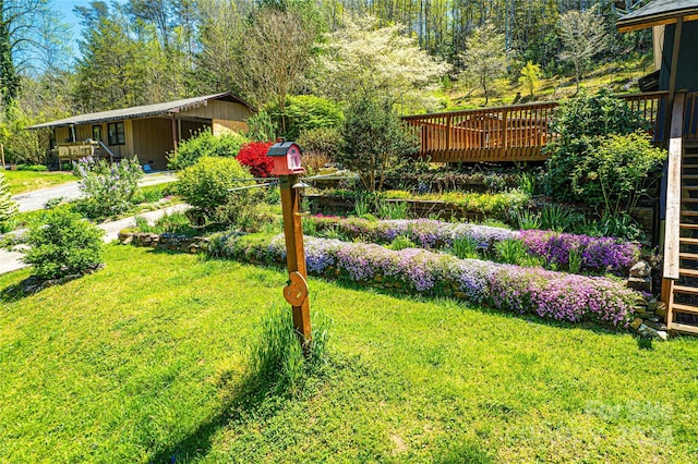 view of yard featuring a deck