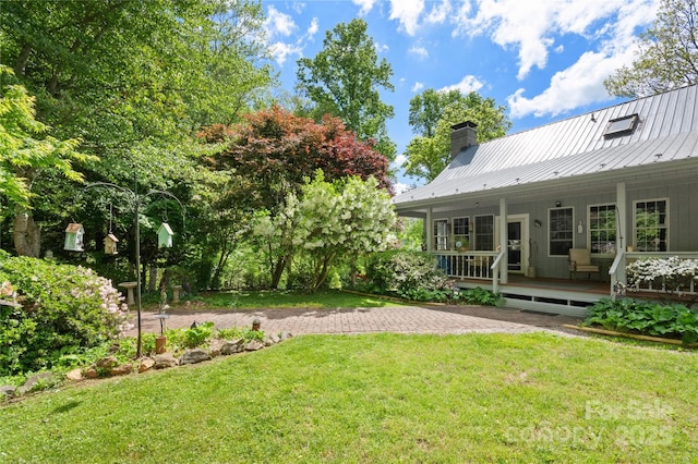 view of yard with a deck