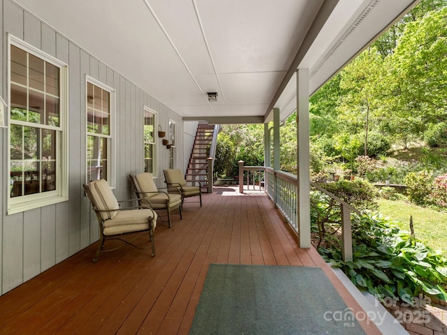 wooden deck with a porch