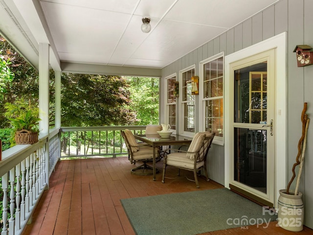 wooden deck featuring covered porch