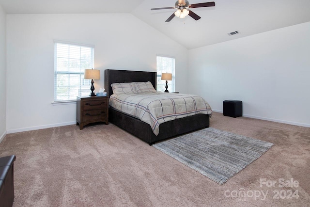 bedroom with carpet, vaulted ceiling, and ceiling fan