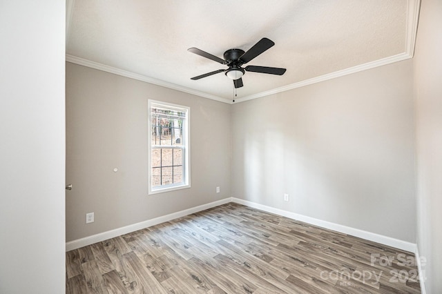 unfurnished room featuring hardwood / wood-style floors, crown molding, a textured ceiling, and ceiling fan