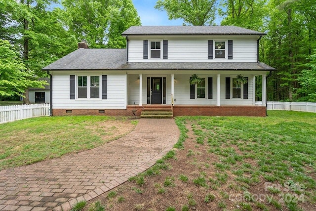 view of front of home with a front lawn