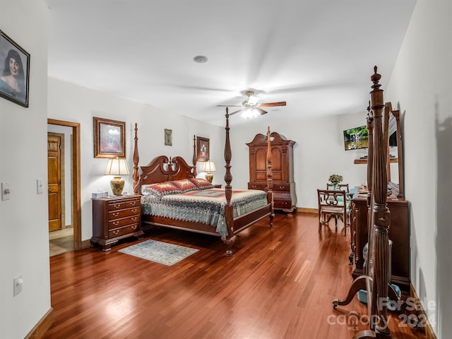 bedroom featuring hardwood / wood-style flooring and ceiling fan