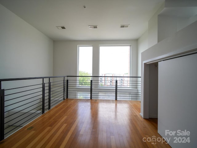 spare room featuring light wood-type flooring