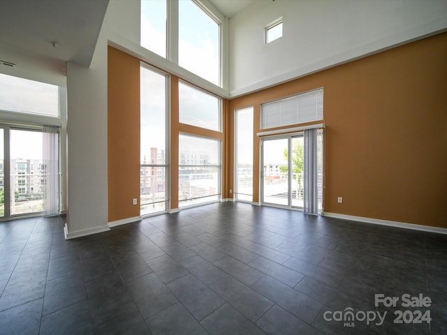 spare room with a high ceiling