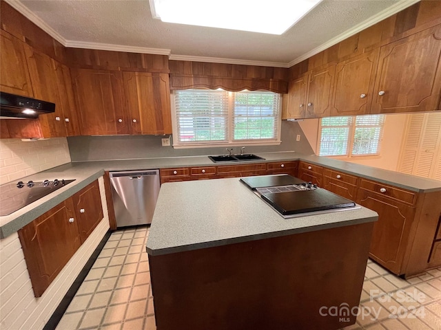 kitchen with dishwasher, ornamental molding, a kitchen island, and sink