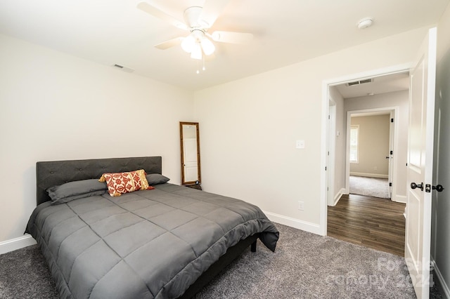 carpeted bedroom featuring ceiling fan