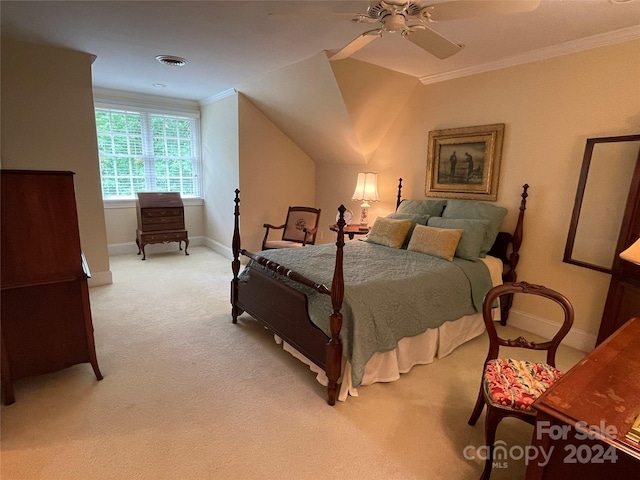 bedroom with ceiling fan, crown molding, and carpet floors