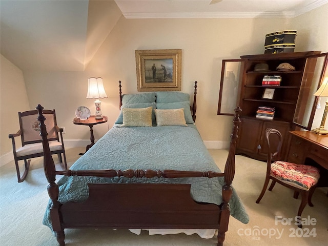 bedroom featuring ornamental molding and carpet floors