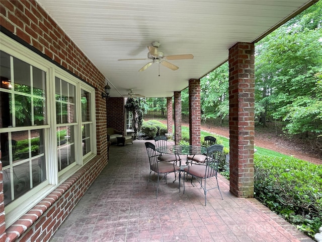 view of terrace featuring ceiling fan