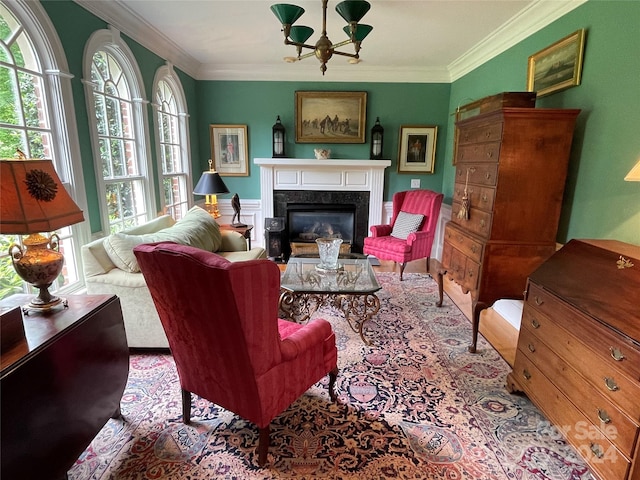 living room featuring a chandelier and crown molding