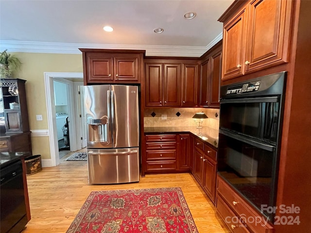 kitchen with backsplash, light hardwood / wood-style flooring, double oven, crown molding, and stainless steel refrigerator with ice dispenser