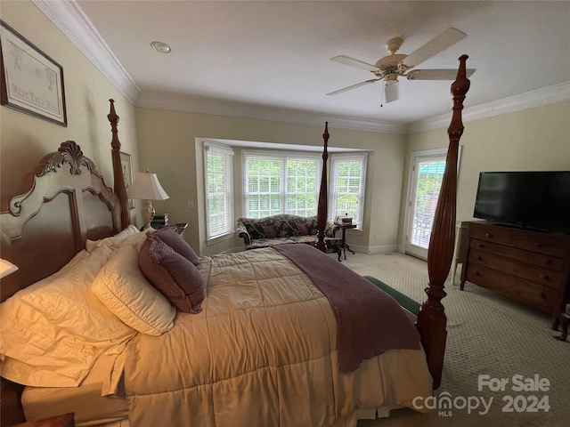 bedroom with crown molding, ceiling fan, and carpet floors