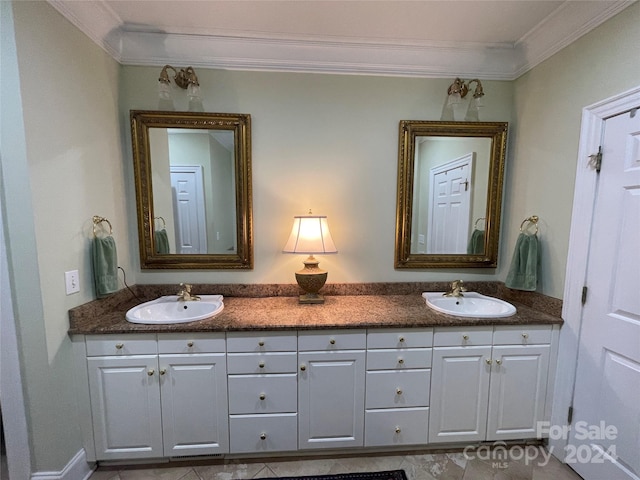 bathroom featuring tile flooring, ornamental molding, and dual vanity