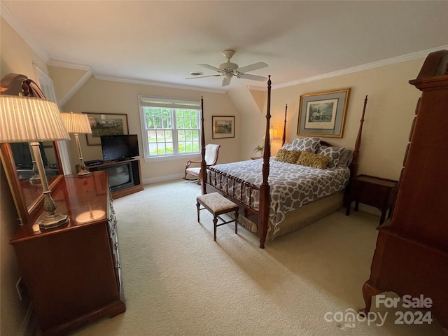 carpeted bedroom with ornamental molding and ceiling fan