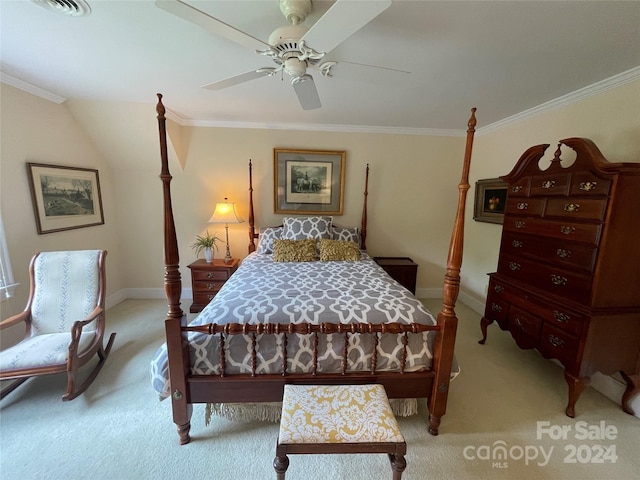 carpeted bedroom featuring ceiling fan and ornamental molding