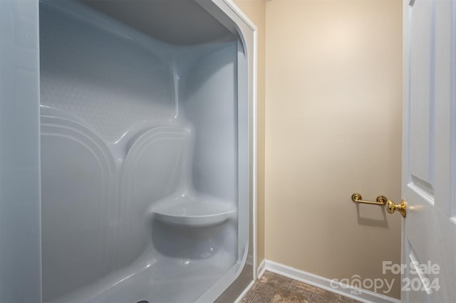 bathroom with tile flooring