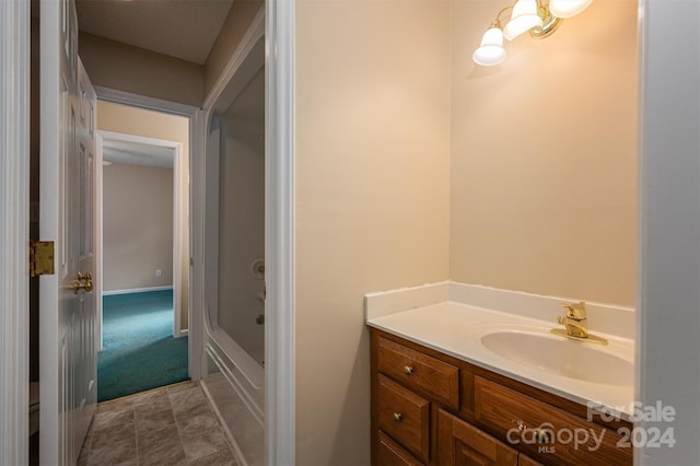 full bathroom featuring tile flooring, shower / tub combination, vanity, and toilet