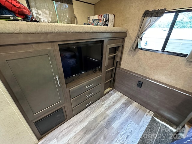 bedroom with light hardwood / wood-style flooring