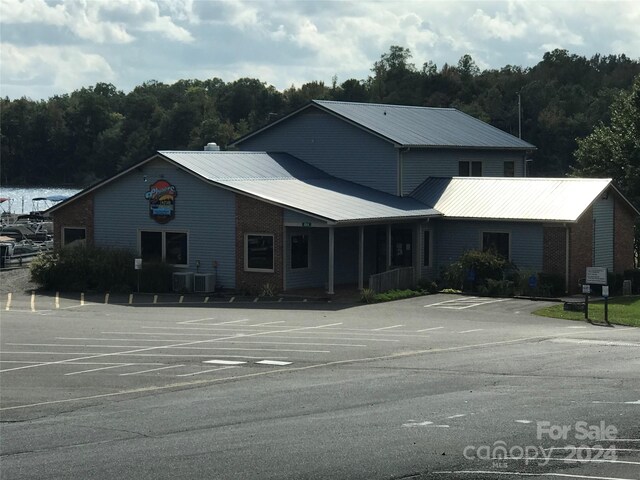 view of front of property featuring central AC unit