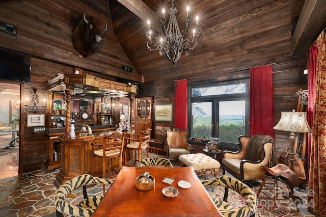 tiled living room featuring wooden walls, high vaulted ceiling, french doors, wooden ceiling, and an inviting chandelier