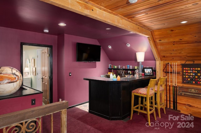 bar with wooden ceiling, vaulted ceiling, and carpet