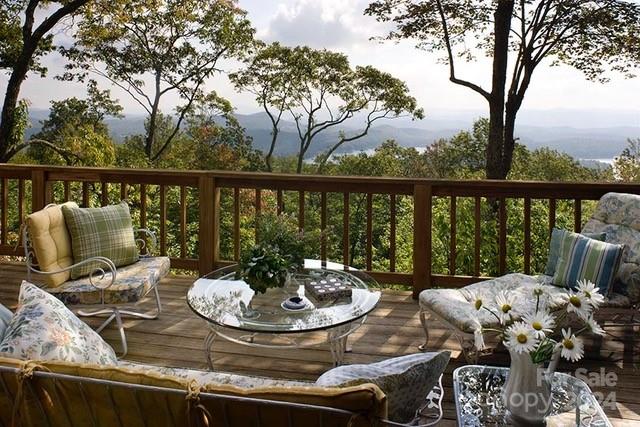 wooden terrace featuring a mountain view