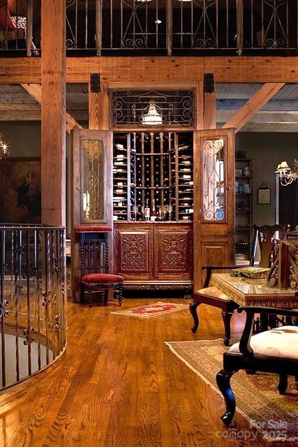 1052 Toxaway Dr, Lake Toxaway, NC 28747 - wine room with wood finished floors