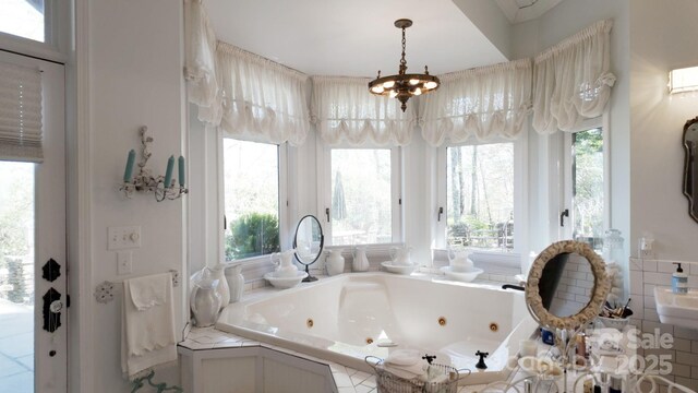 1052 Toxaway Dr, Lake Toxaway, NC 28747 - bathroom with a whirlpool tub and a chandelier