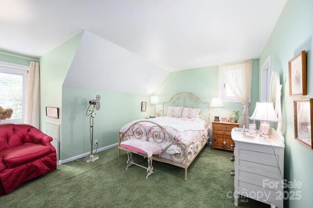 1052 Toxaway Dr, Lake Toxaway, NC 28747 - bedroom featuring carpet, multiple windows, lofted ceiling, and baseboards