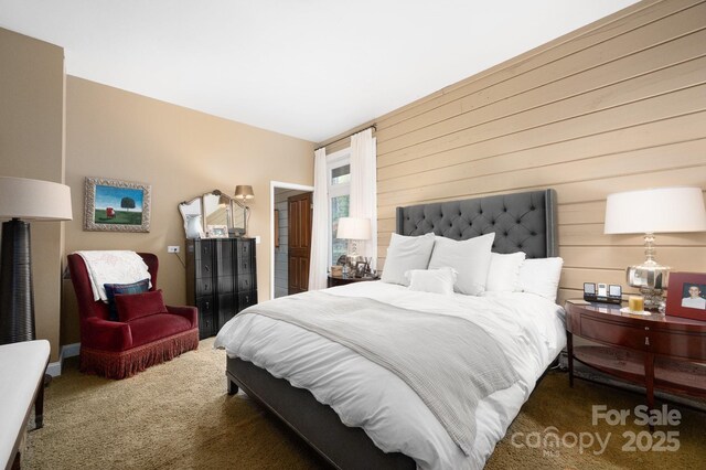 1052 Toxaway Dr, Lake Toxaway, NC 28747 - carpeted bedroom with wood walls