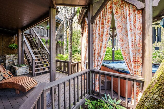 1052 Toxaway Dr, Lake Toxaway, NC 28747 - wooden terrace with a hot tub and stairway