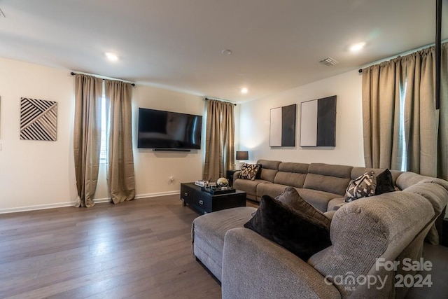 living room featuring dark hardwood / wood-style floors