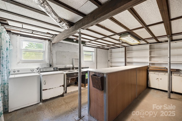 laundry area featuring laundry area and independent washer and dryer