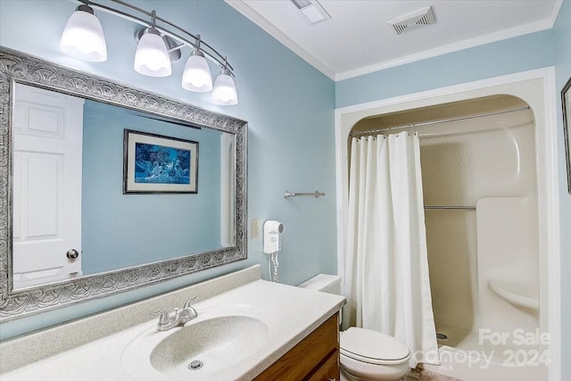 bathroom featuring crown molding, toilet, large vanity, and curtained shower