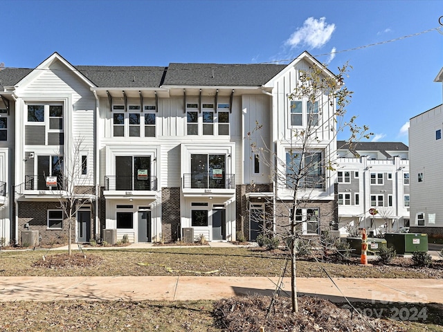 view of front of property featuring central air condition unit