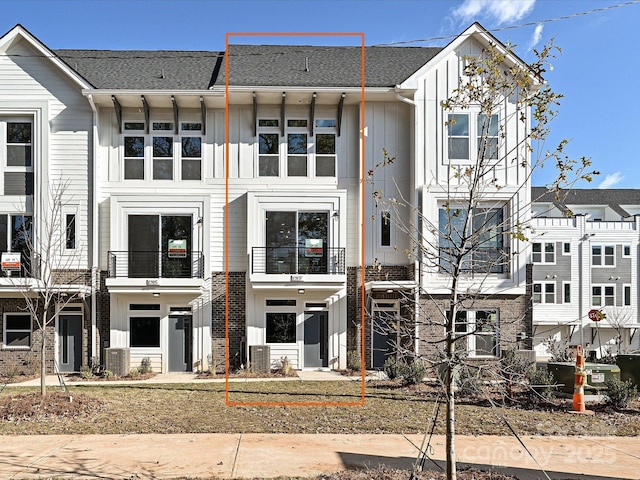 1217 E 34th St Unit Csw0316, Charlotte, NC 28205 - view of property with board and batten siding and a shingled roof