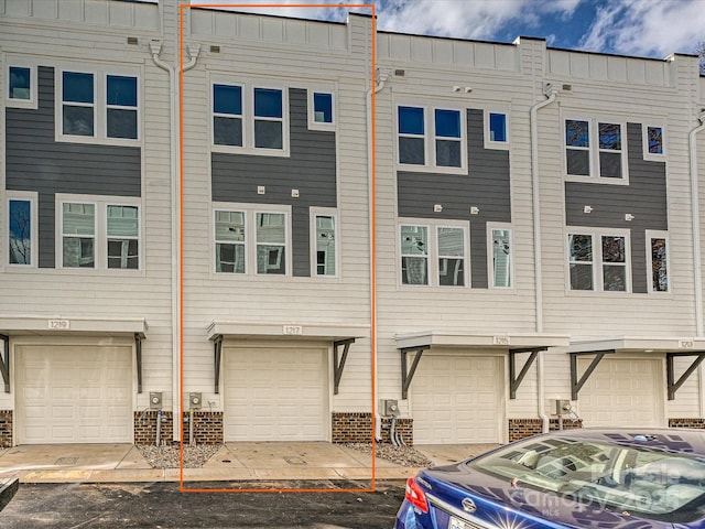 1217 E 34th St Unit Csw0316, Charlotte, NC 28205 - exterior space with an attached garage