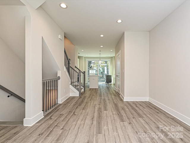 1217 E 34th St Unit Csw0316, Charlotte, NC 28205 - interior space with arched walkways, light wood-style flooring, baseboards, and recessed lighting