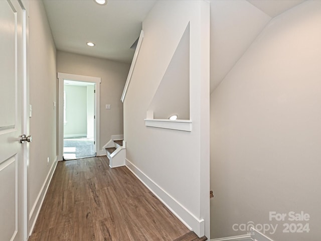 hall with dark hardwood / wood-style floors