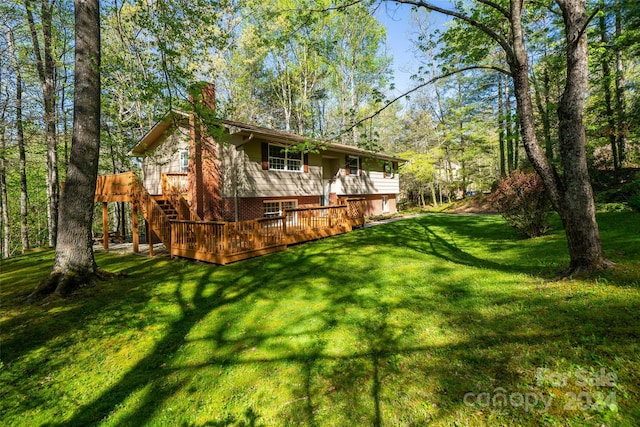 view of yard featuring a deck