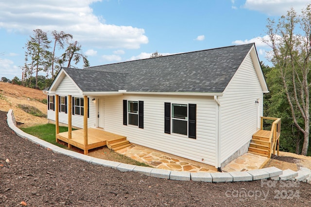 exterior space with a wooden deck