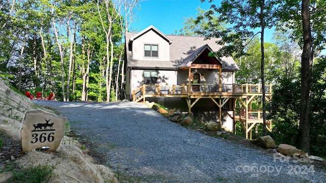 view of front of home featuring a wooden deck