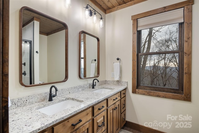 bathroom featuring vanity and wooden ceiling