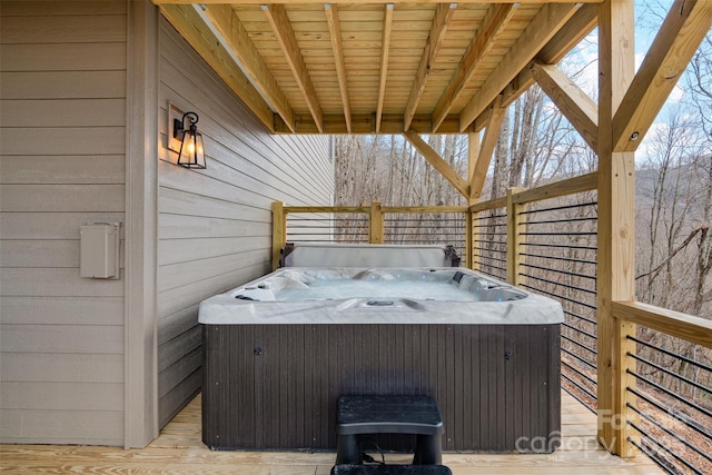 deck with a hot tub