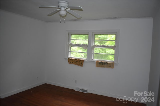 unfurnished room featuring ceiling fan and hardwood / wood-style floors