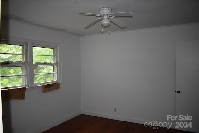 empty room featuring wood-type flooring and ceiling fan