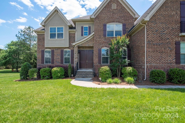 view of front of house with a front yard