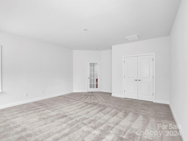 empty room with light carpet